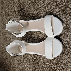 White buckle sandals